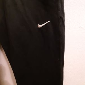 Nike women's JOGGERS  sz::s.. dry fit. Has a small zp packed on the back.